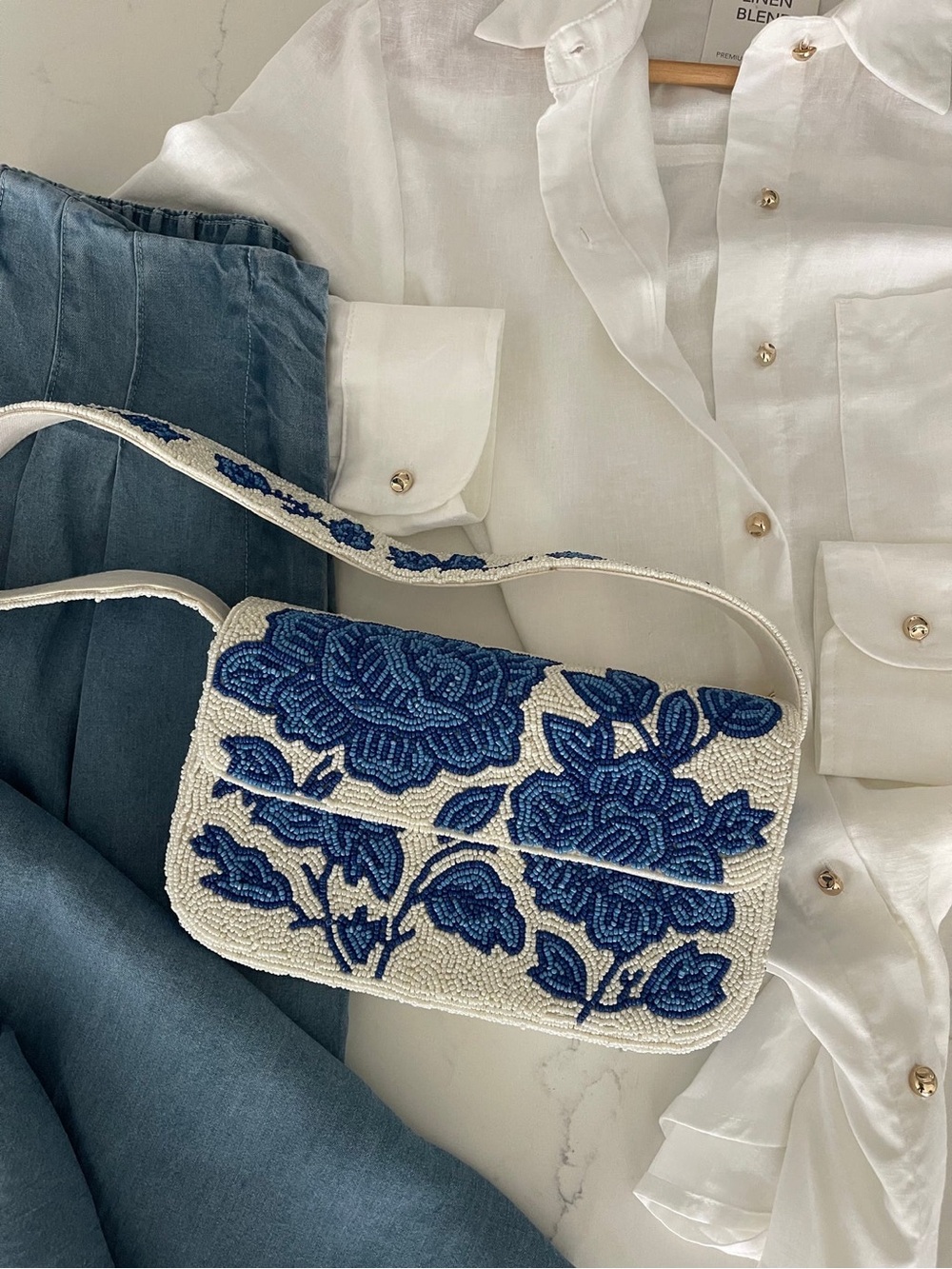 White Beaded Shoulder Bag with Blue Floral Design - Picture 4 of 5